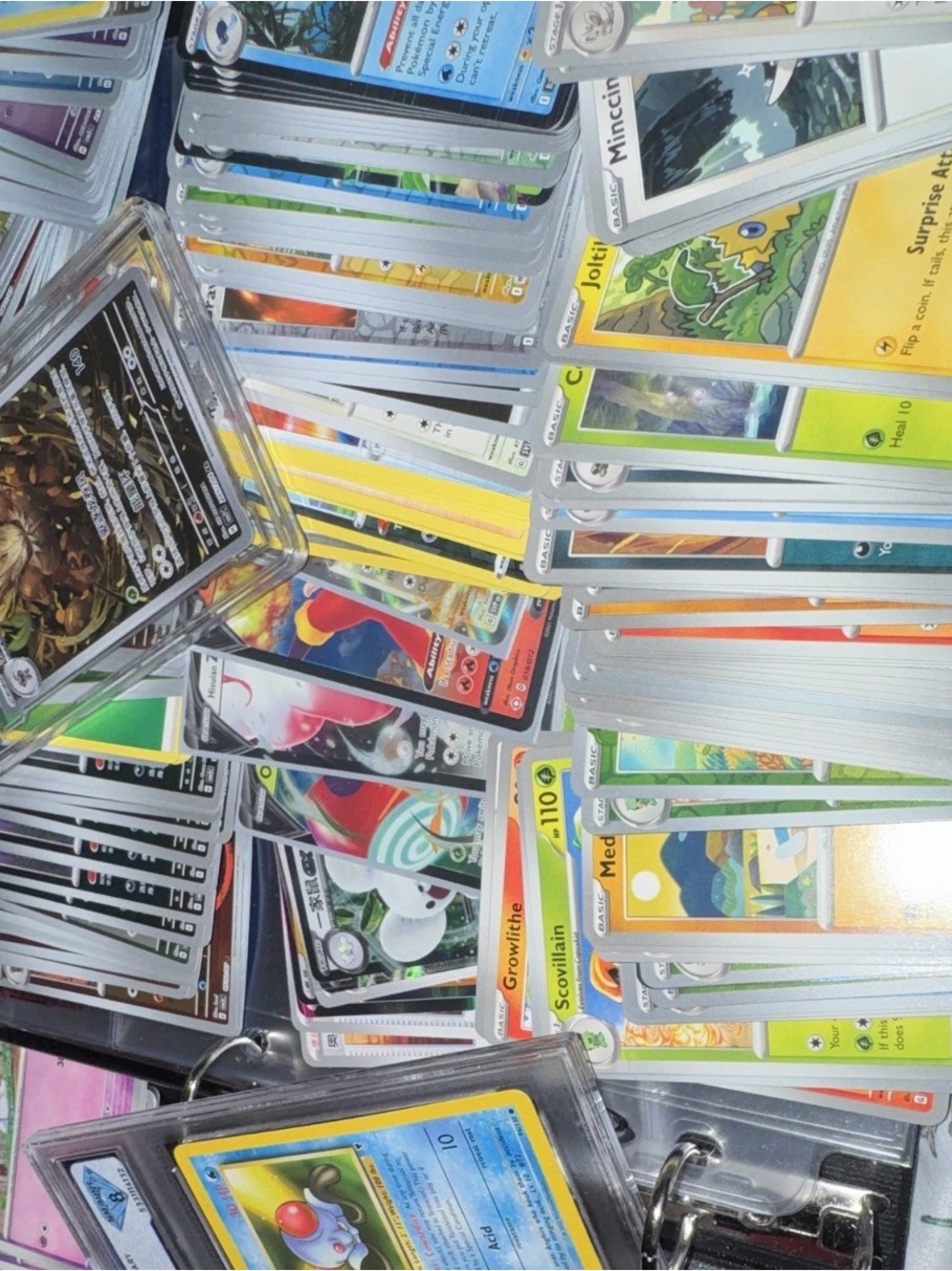 3 slabs and 500 bulk Assorted Pokemon Trading Cards includes holo/ex/etc